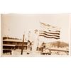 Image 1 : Woman Holding a Large American Flag in Truckee