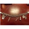 Image 1 : BRACELET- STERLING SILVER WITH 6 STERLING SILVER CHARMS