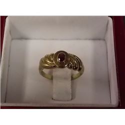 RING - 10KT YELLOW GOLD WITH SOLITAIRE .24CT OVAL FACETED GARNET GEMSTONE - BAZEL-SET - INCLUDES CER