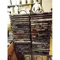 RACK OF ABOUT 50 DVD'S