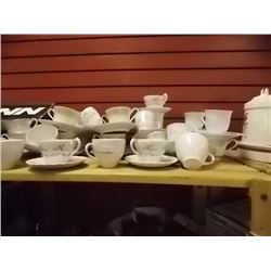 TEA CUPS AND SAUCERS