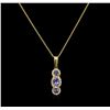 Image 1 : 0.56 ctw Tanzanite and Diamond Pendant With Chain - 14KT Yellow Gold