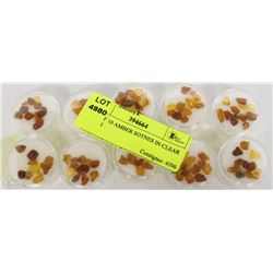 SET OF 10 AMBER STONES IN CLEAR CASES