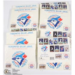 36) A BAG OF 12 SETS OF TORONTO BLUE JAYS POST