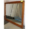 Image 1 : A MIRROR IN A WOODEN FRAME 41” X 29”
