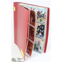 BINDER WITH OVER 75 HOCKEY ROOKIE CARDS