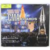 Image 1 : THE CMA AWARDS VAULT COLLECTORS BOOK
