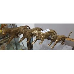 FOUR BRASS TIGERS