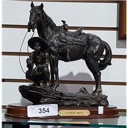 COWBOY STATUE IN RESIN