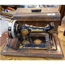 COFFIN TOP PORTABLE JONES SEWING MACHINE