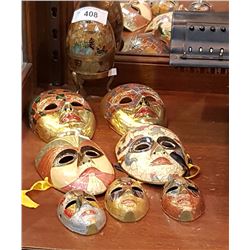 7 ENAMLE & BRASS MASKS & 1 ENAMLE & BRASS EGG