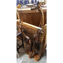 SET OF THREE HAND CARVED WOOD GIRAFFES TALLEST IS APPROX 48"