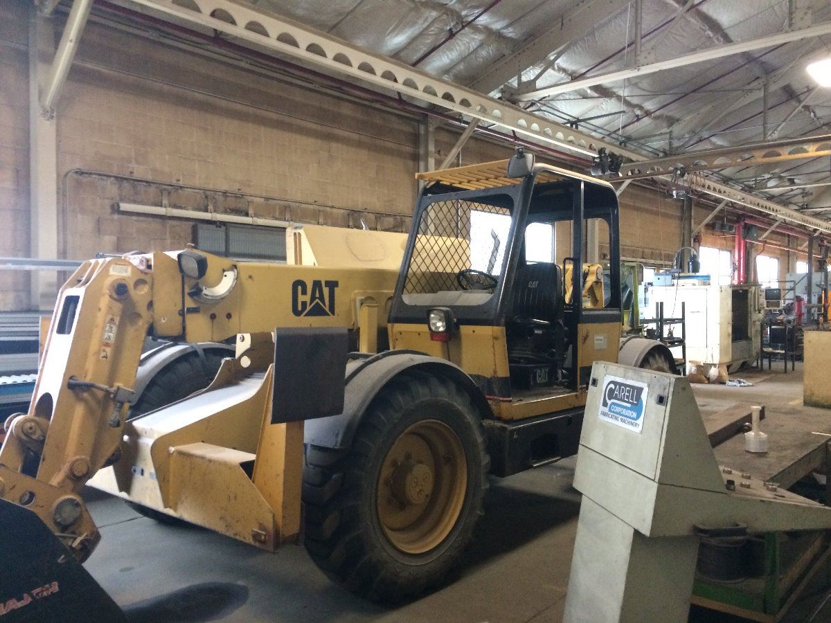 Caterpillar TH63 Telescopic Forklift / Telehandler - BTM Industrial