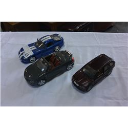 THREE DIE CAST CARS