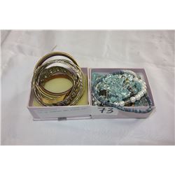 LOT OF BANGLES AND RINGS ETC