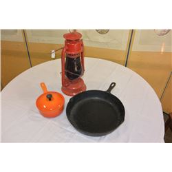 TWO CAST IRON PANS AND BEACON HURRICANE LANTERN