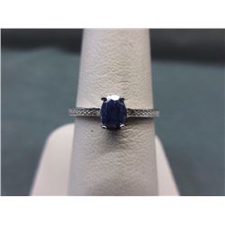 RING - OVAL FACETED BLUE SAPPHIRE & 2 DIAMONDS IN STERLING SILVER SOLITAIRE DESIGNED SETTING - RETAI