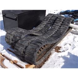 Bobcat T300 rubber tracks, about 60%
