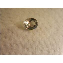 OVAL FACETED LIGHT GREEN TOPAZ - 9.8 X 7.6 X 5.8mm