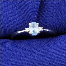 Blue Topaz and Diamond Ring