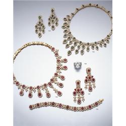 A SUITE OF RUBY AND DIAMOND JEWELRY COMPRISING A NECKLACE OF FRINGE DESIGN, COMPOSED OF A SERI