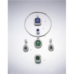 A PAIR OF EMERALD AND DIAMOND EARPENDANTS EACH SUSPENDING A PEAR SHAPED EMERALD DROP WITHIN A