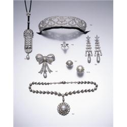 A DIAMOND ONYX AND NATURAL PEARL PENDANT THE SHAPED RECTANGULAR PLAQUE OF OPENWORK DESIGN DEPI