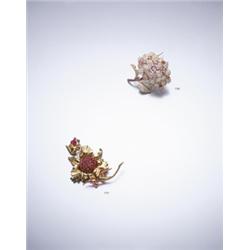 AN IMPORTANT FANCY PINK AND COLORLESS DIAMOND FLOWER BROOCH DESIGNED AS A FOLIATE CLUSTER SPRA