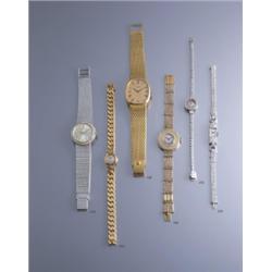 PATEK PHILIPPE A GENTLEMAN'S GOLD WRISTWATCH THE OVAL SHAPED GOLD COLORED DIAL APPLIED WITH