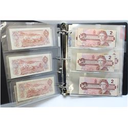 BINDER FULL OF OLD PAPER MONEY, 12 X $1 & $2 BILLS