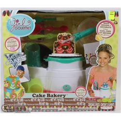NEW GIRL GOURMET ACE OF CAKE