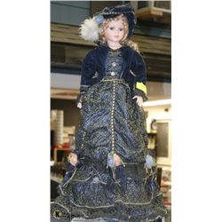 LARGE PORCELAIN DOLL WITH STAND
