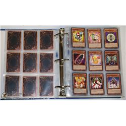 ALBUM OF 730 YU-GI-OH TRADING CARDS