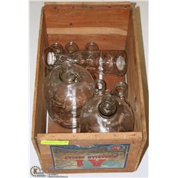 A VINTAGE WOODEN APPLE BOX W/ GLASS BOTTLES