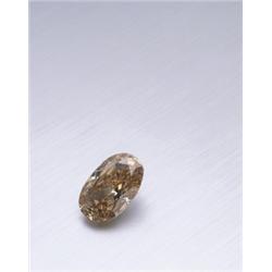 A MAGNIFICENT FANCY YELLOW BROWN DIAMOND RING THE OVAL SHAPED DIAMOND WEIGHING 107.35