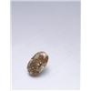 Image 1 : A MAGNIFICENT FANCY YELLOW BROWN DIAMOND RING THE OVAL SHAPED DIAMOND WEIGHING 107.35