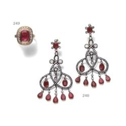 A PAIR OF RUBY AND DIAMOND EARPENDANTS OF OPENWORK SCROLL DESIGN SET THROUGHOUT WITH SINGLE AN