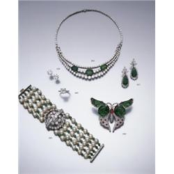 A PAIR OF EMERALD AND DIAMOND EARPENDANTS EACH SUSPENDING A PEAR SHAPED EMERALD WITHIN A MARQU