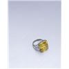 Image 1 : A MAGNIFICENT FANCY VIVID YELLOW DIAMOND RING THE FANCY VIVID YELLOW SQUARE EMERALD-CUT DIAMON...