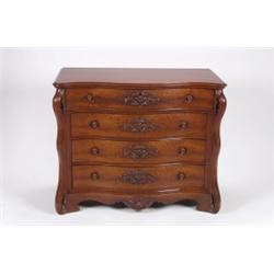 A MID-19TH CENTURY, WALNUT SERPENTINE FRONT CHEST, of four long drawers with carved ornamentati...