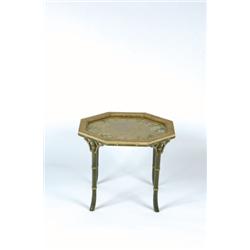 AN ANTIQUE OCTAGONAL ROLLED PAPERWORK PANEL, of foliate design, in a lacquered frame and adapted...