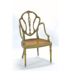 AN ANTIQUE ARMCHAIR, IN THE LATE 18TH CENTURY MANNER, pale green lacquered and gilded, with elabo...