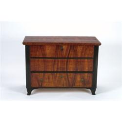 AN EARLY 19TH CENTURY GRAIN PAINTED AND EBONIZED BLANKET BOX, full length drawer below and on sha...
