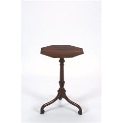 A SMALL EARLY GEORGE III MAHOGANY OCCASIONAL TABLE, the octagonal top, crossbanded, on turned p...