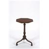Image 1 : A SMALL EARLY GEORGE III MAHOGANY OCCASIONAL TABLE, the octagonal top, crossbanded, on turned p...