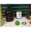 Image 5 : Lot of Misc. (Brown Glass Jug, Antique Metal Floor Jacks, Volkswagon Hub Cap, Etc.)