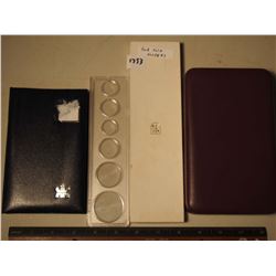 4 Assorted Empty Coin Holders (medium)