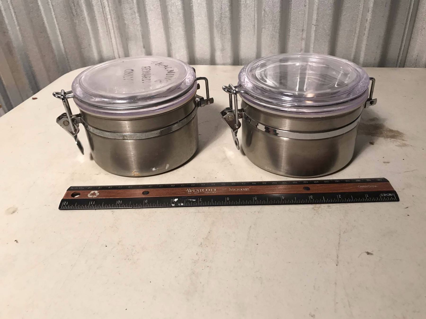 Pair of Metal Containers With Gasket Sealed Lids And Contents