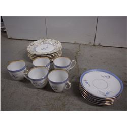 Decorative Tea Set With Cups, Saucers, and Plates