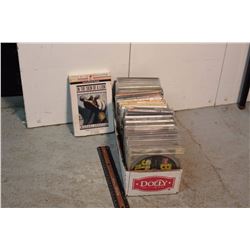 Lot of CDs With "In The Skin of A Lion" Tapes